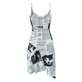 Dress made from newspaper print on a white background